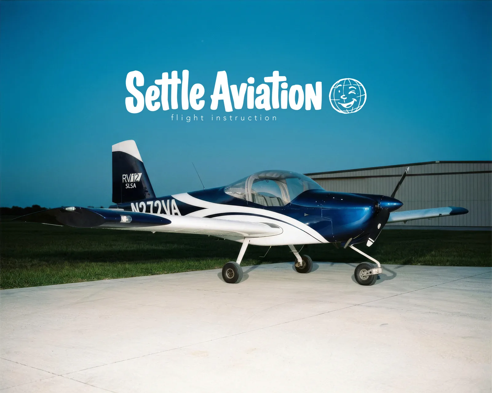 N272VA, a blue and white Van's RV-12, parked on the ramp at dusk under the Settle Aviation logo